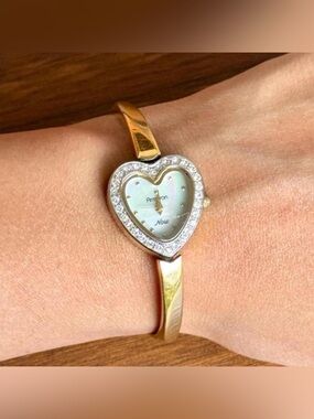 Armitron heart shaped watch with diamond accents untested